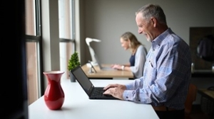 Staff working on computers